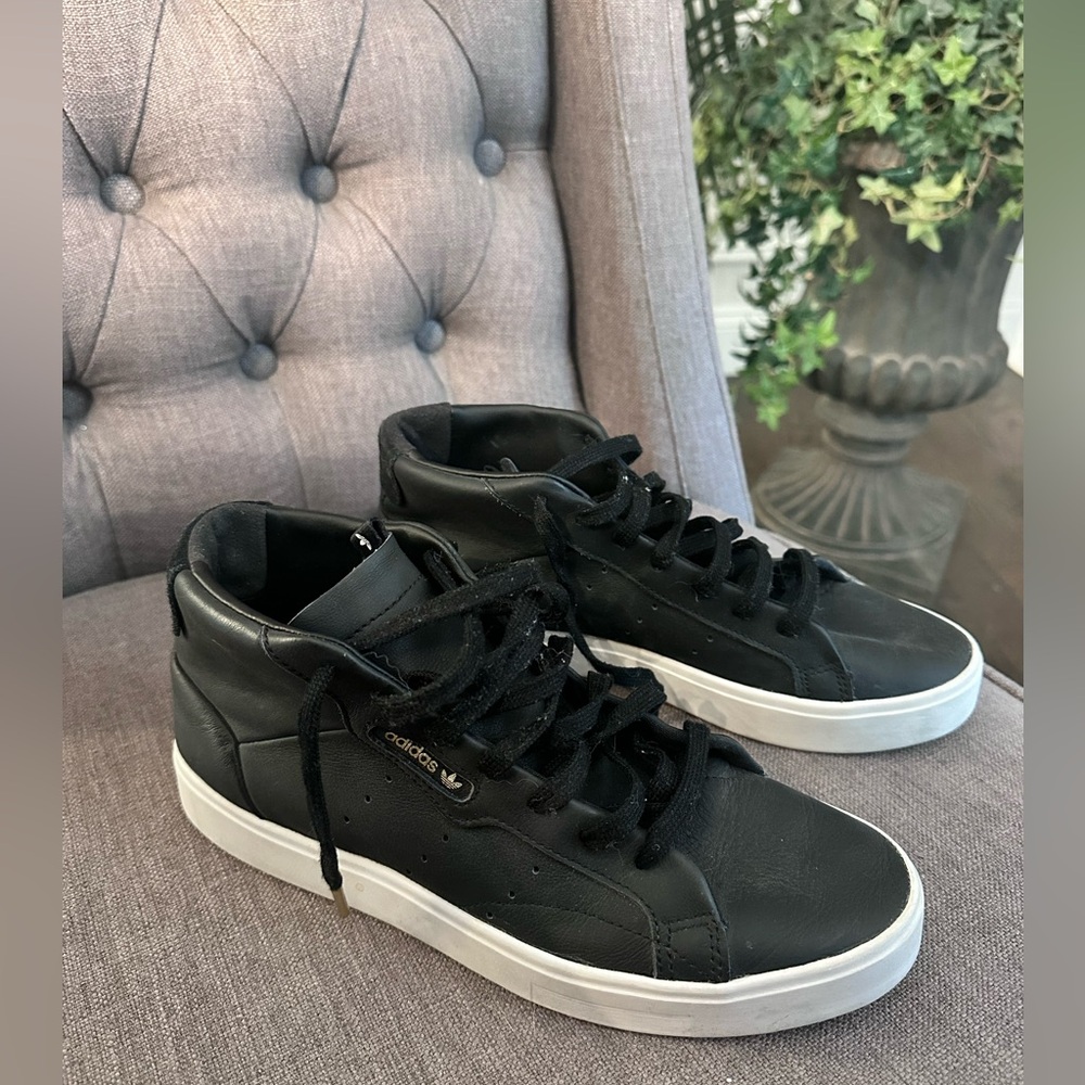 Black and Gold adidas high tops 7.5